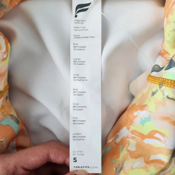 Fabletics Define PowerHold® High-Waisted 7/8 Legging. Color: PAINTED MARIGOLD. S - Picture 9 of 12
